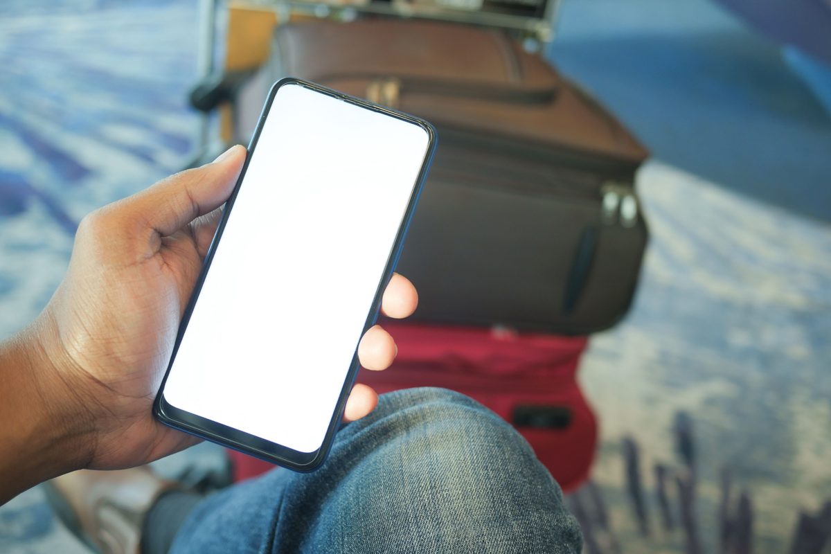 Traveler checking mobile devices while in transit